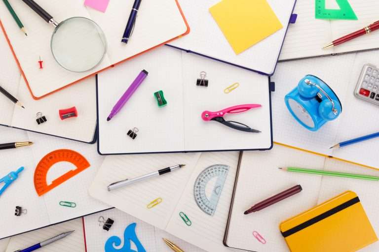 notepad or notebook with school supplies